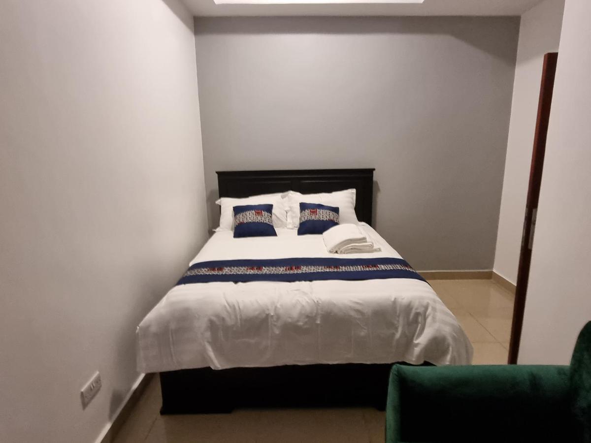 Eika Suites At Acacia Кампала Экстерьер фото
