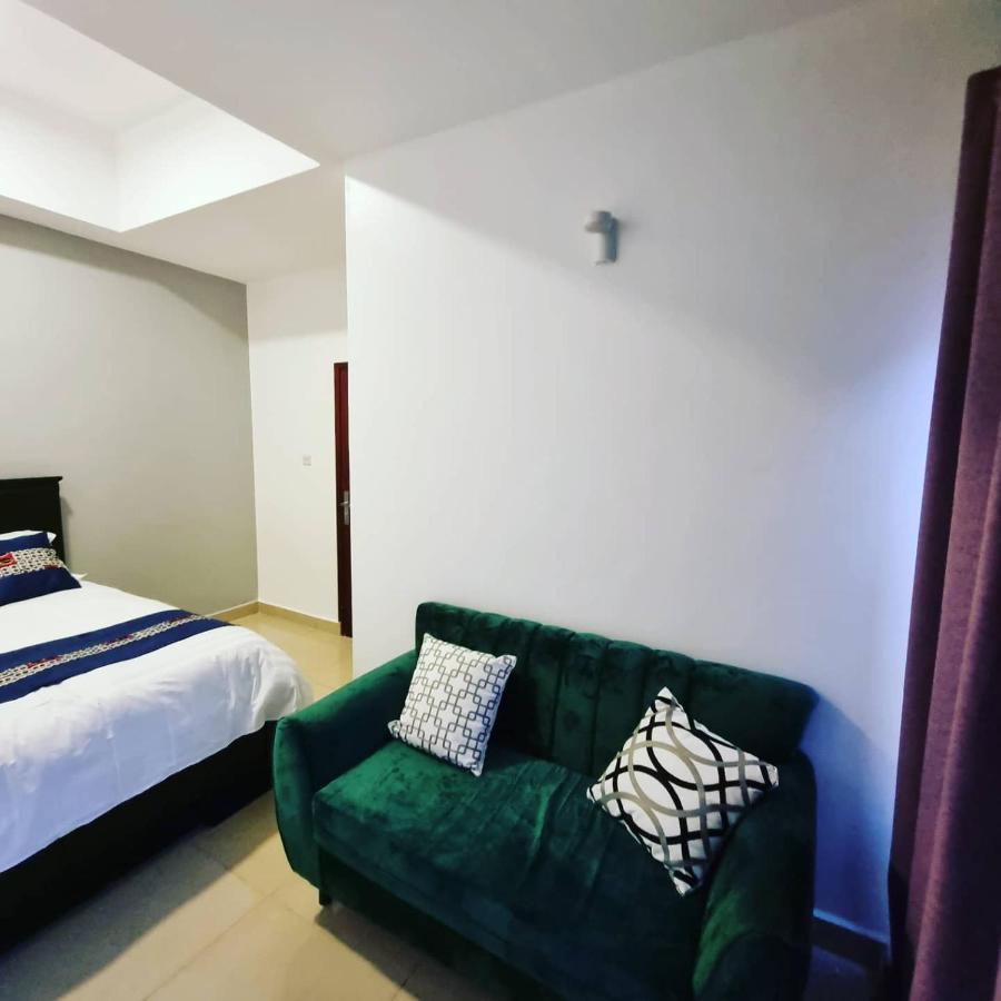 Eika Suites At Acacia Кампала Экстерьер фото