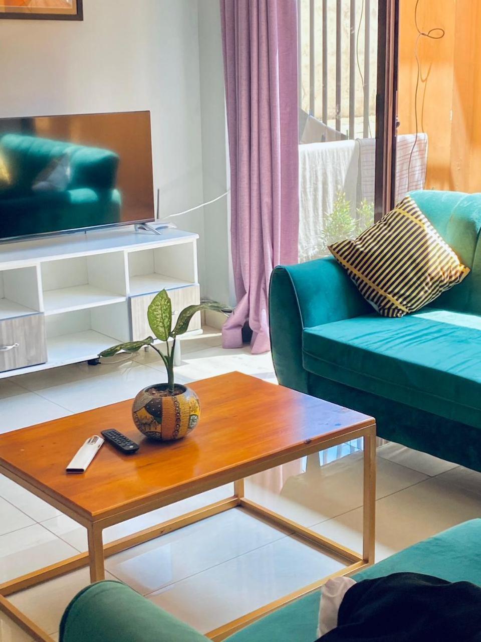 Eika Suites At Acacia Кампала Экстерьер фото